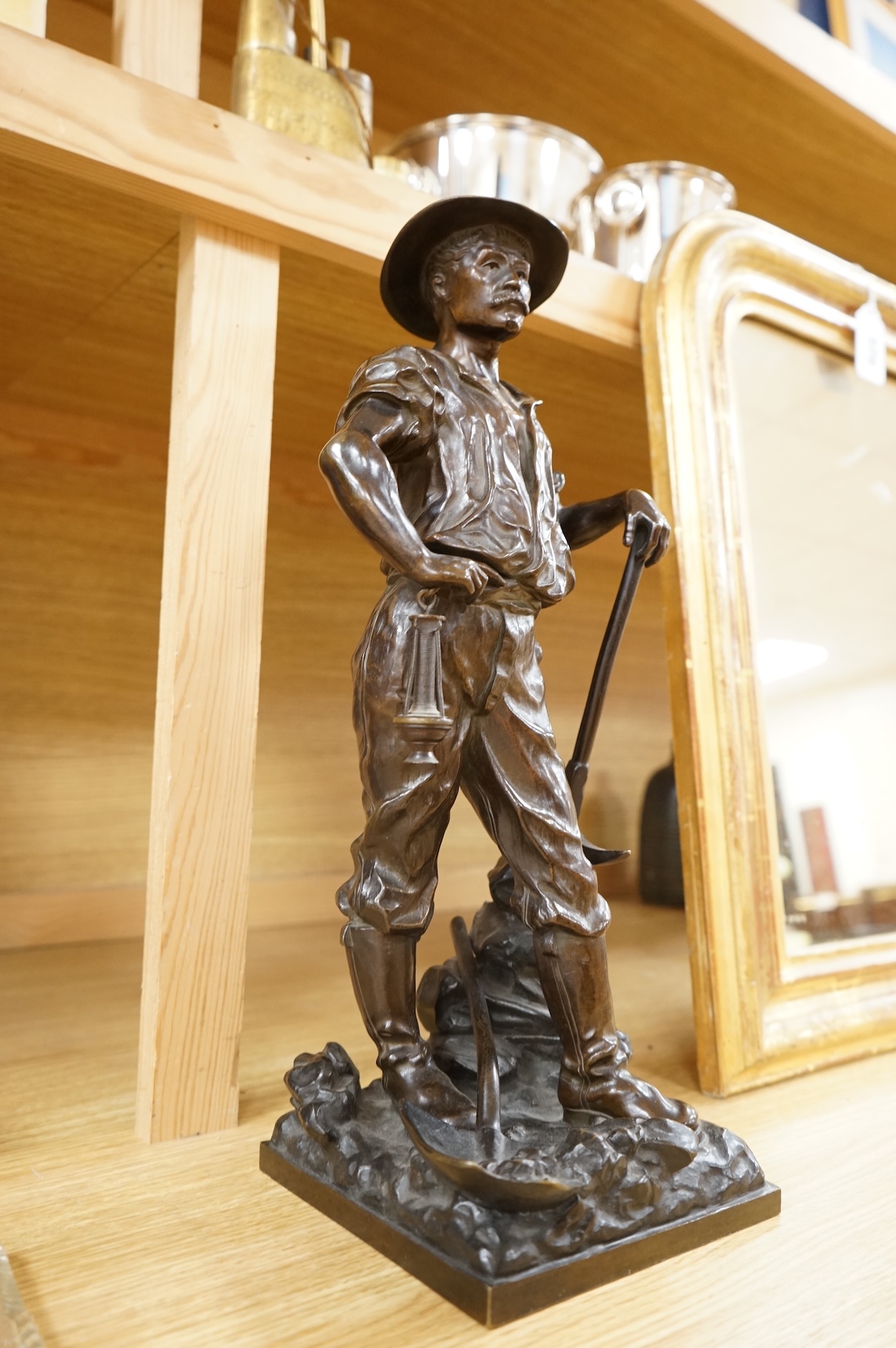 After Jean Garnier (French, 1820-1895), bronze model, ‘Worker Puller Carrier’, 43cm